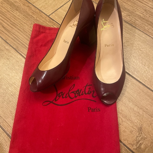 Wine colored leather peep toe Louboutins